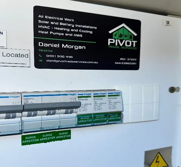 Switchboard fitted with three surge arrestors alongside the main breakers